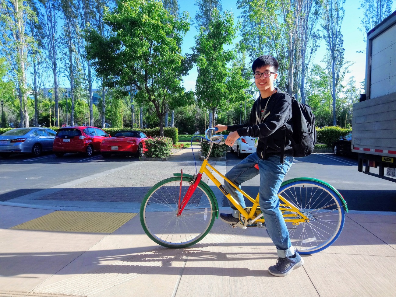 Henry Lim riding a GBike at Google's Mountain View campus in California.